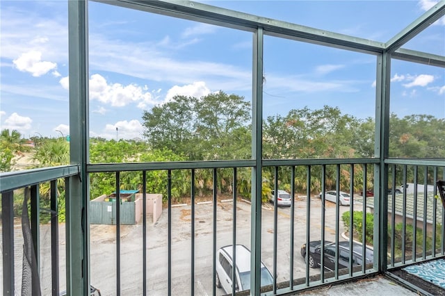 unfurnished sunroom with a wealth of natural light