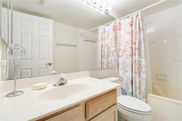 full bathroom featuring vanity, shower / bathtub combination with curtain, and toilet