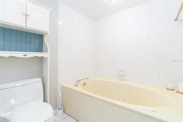 bathroom featuring tile patterned flooring and toilet