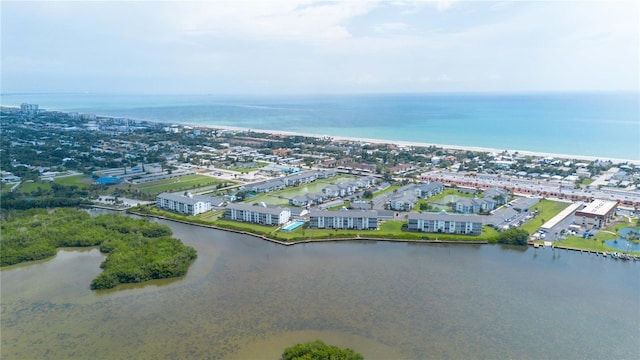 drone / aerial view with a water view