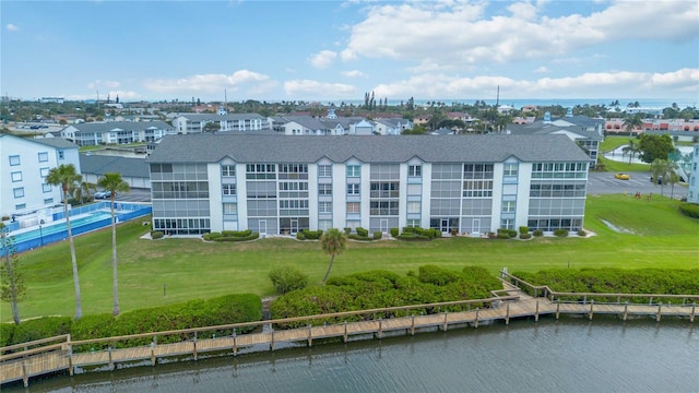 drone / aerial view with a water view