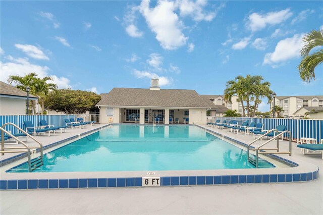 view of swimming pool featuring a patio area