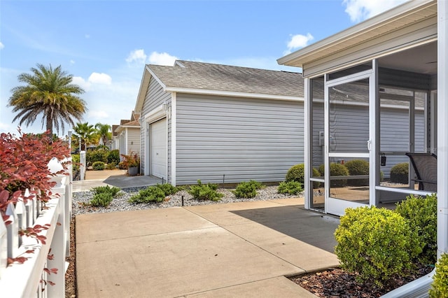 view of patio / terrace with a garage