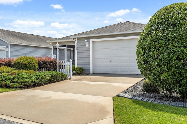 single story home featuring a garage