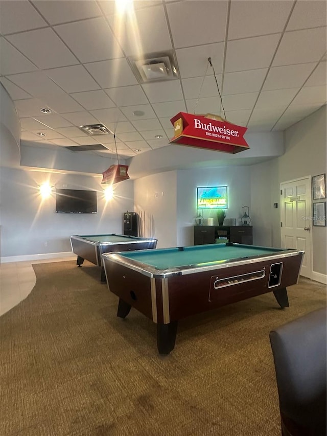 game room featuring carpet flooring and a drop ceiling