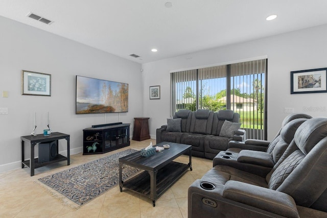 living room featuring recessed lighting, visible vents, baseboards, and light tile patterned flooring