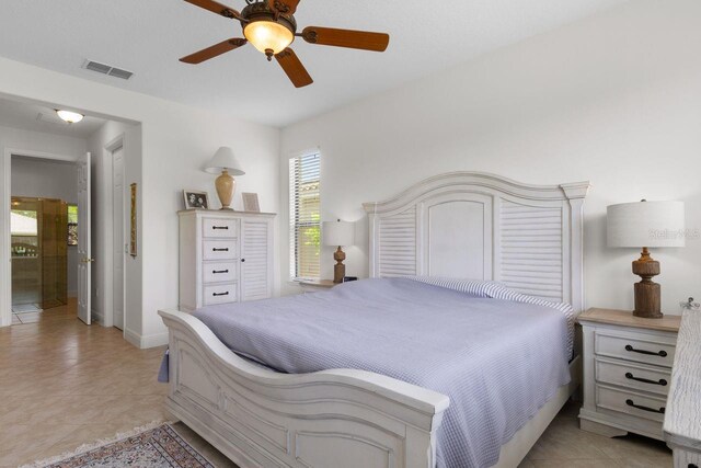 bedroom featuring ceiling fan and light tile patterned floors