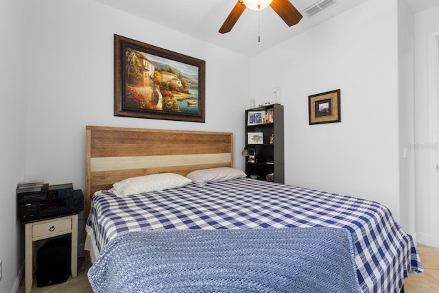 bedroom featuring a ceiling fan and visible vents