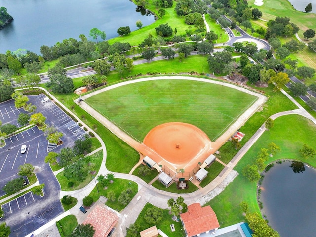 birds eye view of property featuring a water view