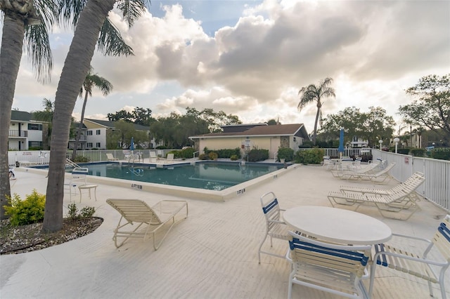 view of pool featuring a patio