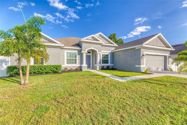 ranch-style house with a front lawn and a garage