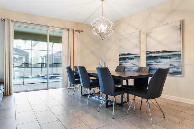 dining room with light tile patterned flooring and a chandelier