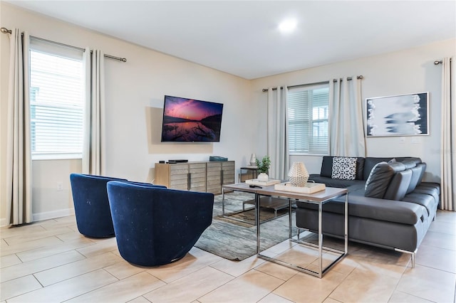 living room with light tile patterned floors