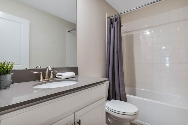 full bathroom with shower / bath combination with curtain, toilet, and vanity