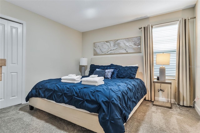 bedroom featuring carpet