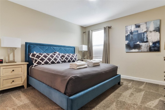 bedroom with dark carpet