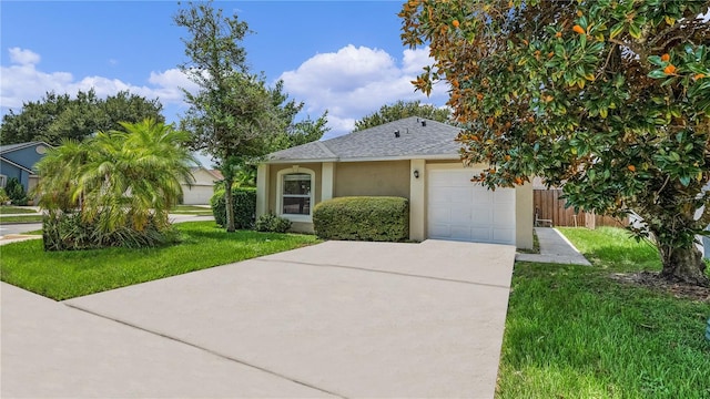 view of front of house featuring a garage and a front yard