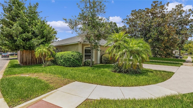 view of front of house with a front lawn