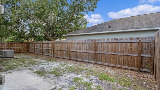 view of yard with central AC