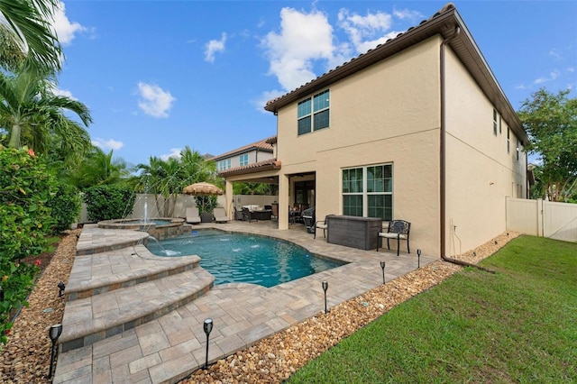 view of pool featuring a patio, a fenced backyard, an in ground hot tub, an outdoor living space, and a fenced in pool