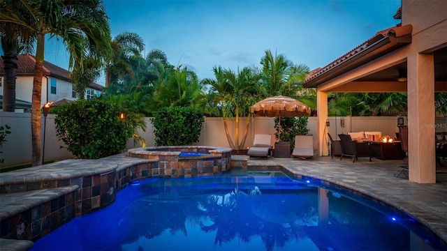 view of pool featuring an in ground hot tub, a gazebo, and a patio area