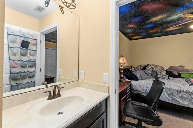 full bathroom featuring visible vents and vanity