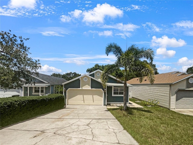 ranch-style house featuring a garage and a front lawn