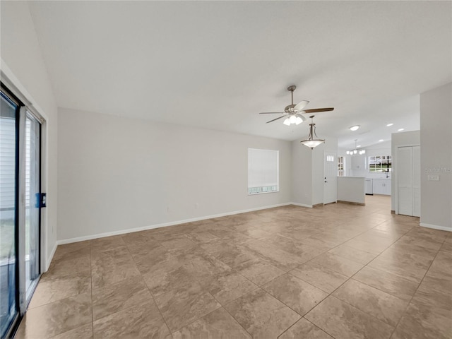 unfurnished living room featuring ceiling fan