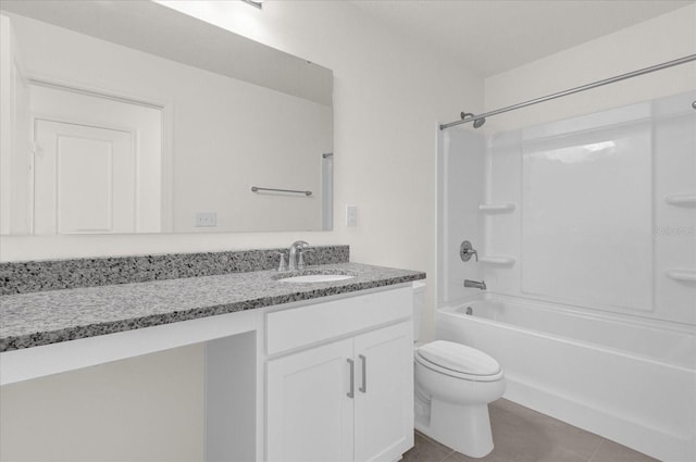 full bathroom featuring vanity, tile patterned flooring, toilet, and tub / shower combination