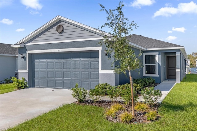 single story home with a front lawn and a garage