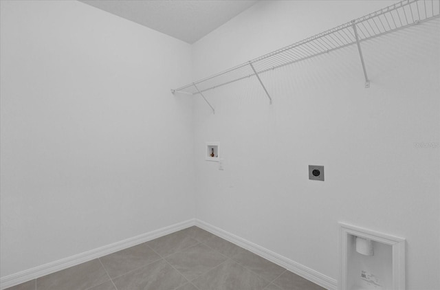 washroom featuring tile patterned floors, washer hookup, and electric dryer hookup