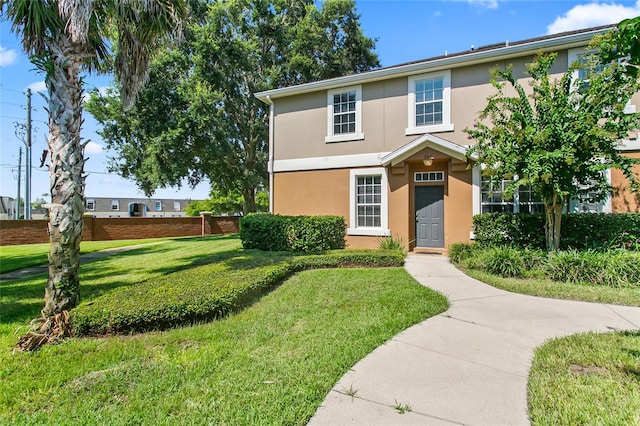 view of front of home with a front yard