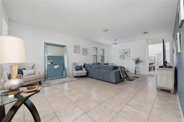 living room with light tile patterned floors