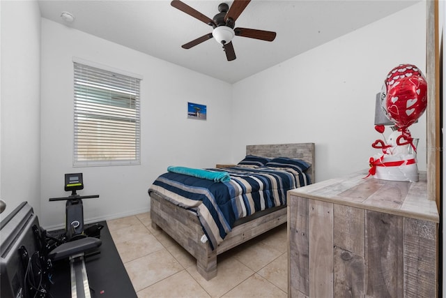 bedroom featuring ceiling fan and light tile patterned floors