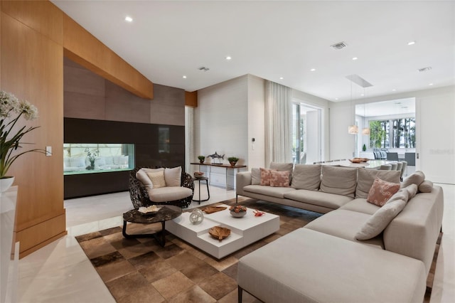 living room with light tile patterned floors