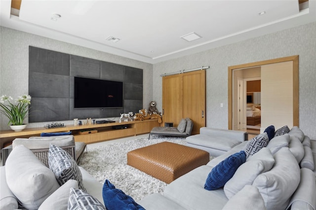 living room featuring a barn door