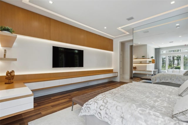 bedroom featuring dark hardwood / wood-style flooring