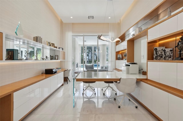 office with light tile patterned floors