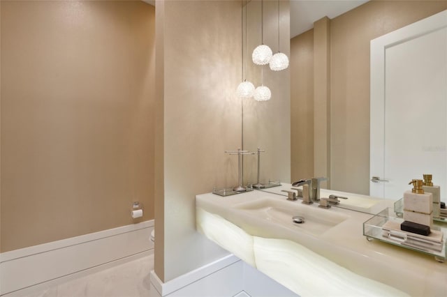 bathroom featuring sink and tile patterned floors