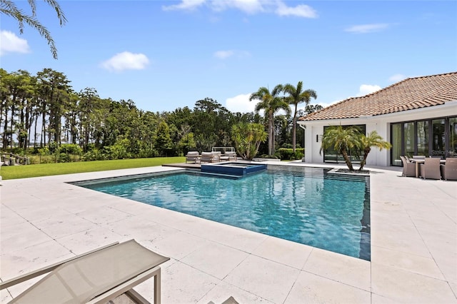 view of swimming pool featuring a patio