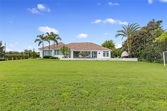 exterior space featuring a lawn