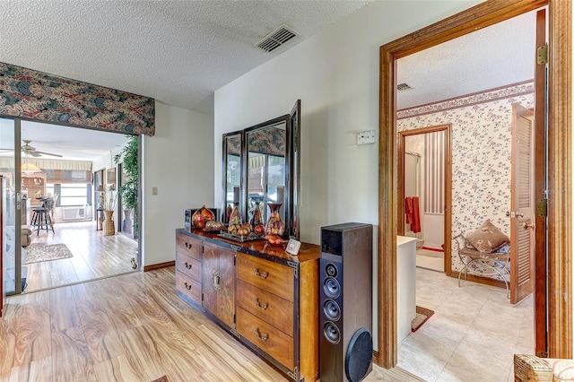 1546 Stormway Ct, Apopka, FL 32712 - hallway featuring a textured ceiling and baseboards