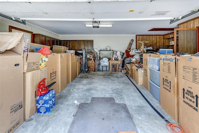 1546 Stormway Ct, Apopka, FL 32712 - garage featuring a garage door opener