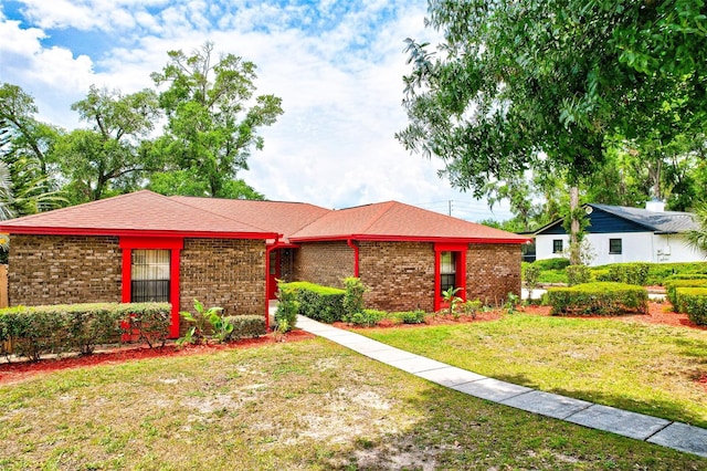 1546 Stormway Ct, Apopka, FL 32712 - ranch-style house with brick siding and a front lawn