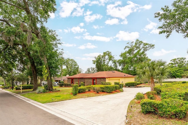 1546 Stormway Ct, Apopka, FL 32712 - ranch-style home with concrete driveway and an attached garage