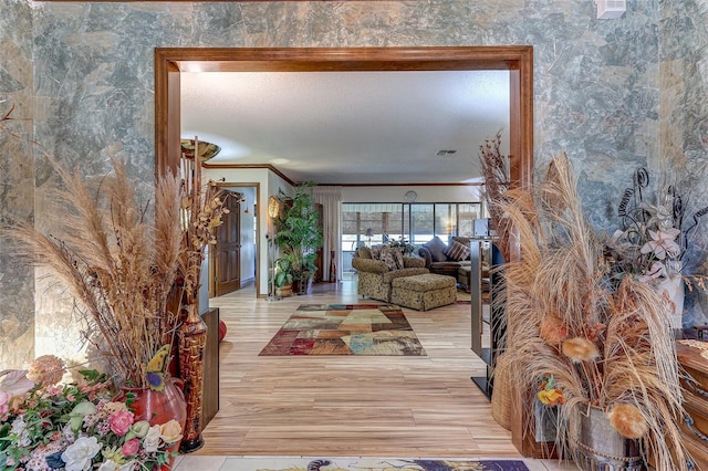 1546 Stormway Ct, Apopka, FL 32712 - foyer entrance with crown molding and light wood-type flooring