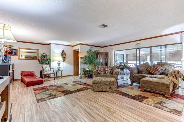 1546 Stormway Ct, Apopka, FL 32712 - living room with a textured ceiling, healthy amount of natural light, crown molding, wood finished floors, and baseboards