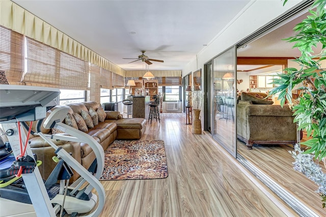 1546 Stormway Ct, Apopka, FL 32712 - living room with ceiling fan, light wood-style floors, and healthy amount of natural light