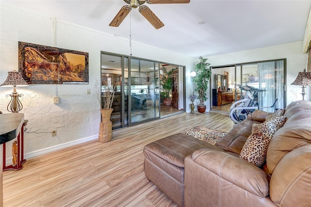 1546 Stormway Ct, Apopka, FL 32712 - living room with ceiling fan, wood finished floors, and baseboards