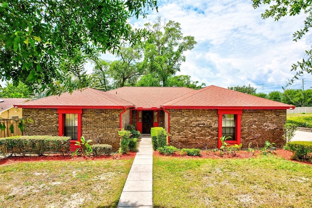 1546 Stormway Ct, Apopka, FL 32712 - view of front facade with roof with shingles and brick siding